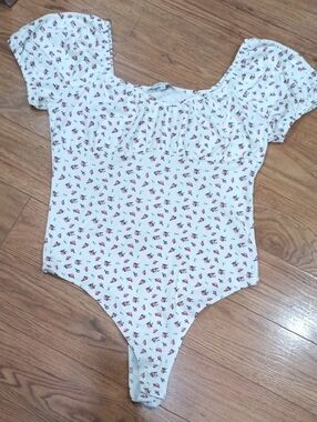 Celebrity Pink White Floral One-Piece Bodysuit